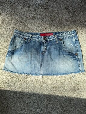VINTAGE Y2K 2006 Guess Blue Washed Denim Mini Skirt with Frayed Hem.